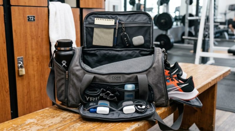 A durable quality gym bag resting on a modern gym bench.